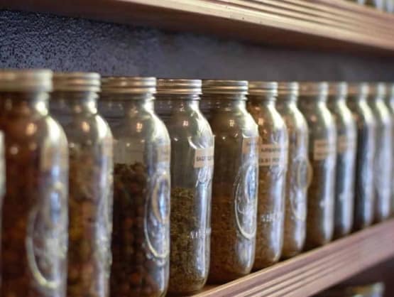 jumpstory download20200406 223903 orig Growing Medicinal Herbs - jars of herbs on a shelf